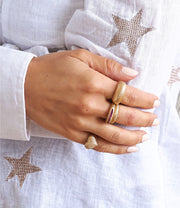 14k gold stacking band with luster finish